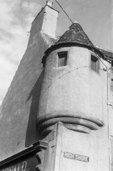 Detail of corbelled angle turret forming corner of 1 High Shore and Carmelite Street, Banff.
