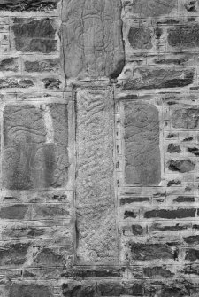 View of Pictish symbol stones and cross-shaft built into gable of  Fyvie Church.
