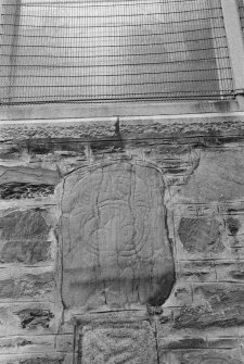 View of Rothiebrisbane Pictish symbol stone built into gable of  Fyvie Church.