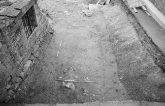 Jedburgh Abbey excavation archive
Frame 20: Area 2: Trench H, almost fully excavated, with replaced soil bank in place. From N.