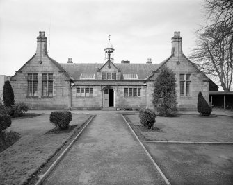 View of out building from SE.