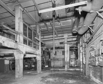 Interior view of Glasgow Herald Building, showing ground floor machine room from N.