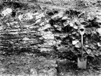 View of the excavation at Rough Castle Roman fort c1904 by Mungo Buchanan showing detail of rampart.