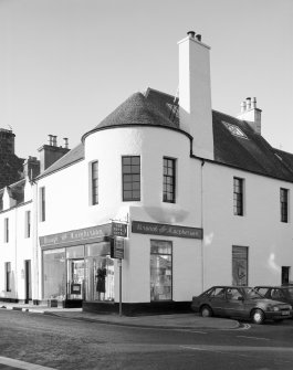 View of 1 Dunira Street, Comrie, showing the premises of Brough and Macpherson from SE.