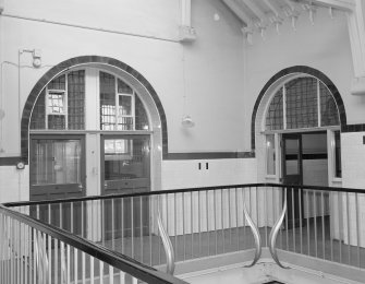 Interior view of Martyr’s Public School, Glasgow, showing landing on second floor of central block from SW.