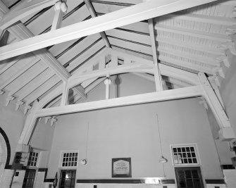 Interior view of Martyr’s Public School, Glasgow, showing roof truss over central block.