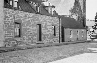General view of buildings on the south side of Drummond Street, Muthill including Lea cottage.