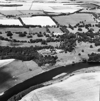 Oblique aerial view centred on country house from S.