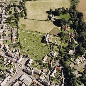 Oblique aerial view of Coldingham centred on the church, taken from the WSW.