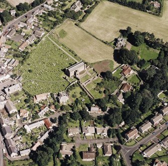 Oblique aerial view of Coldingham centred on the church, taken from the SSW.