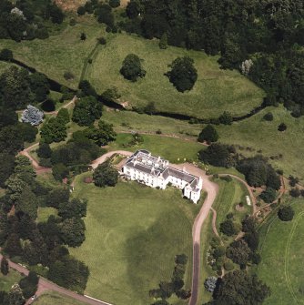 Oblique aerial view centred on the country house, taken from the SW.