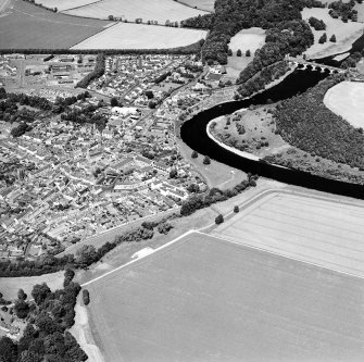 Oblique aerial view centred on the town of Coldstream with road bridge adjacent, taken from the SSW.