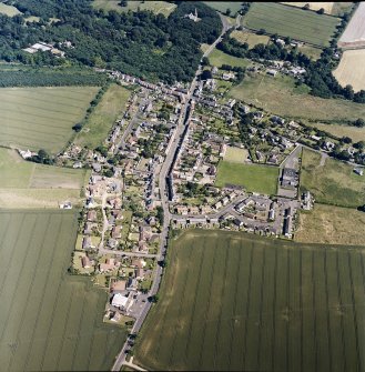 Oblique aerial view centred on Ayton village, taken from the WNW.