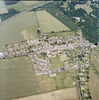 Oblique aerial view centred on Ayton village, taken from the SW.