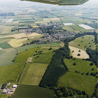 General oblique aerial view centred on the town, with the remains of the redoubt and  fort adjacent, taken from the N.