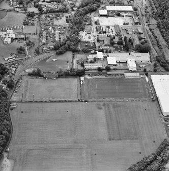 Galashiels, oblique aerial view, taken from the ESE, centred on the football and rugby grounds.
