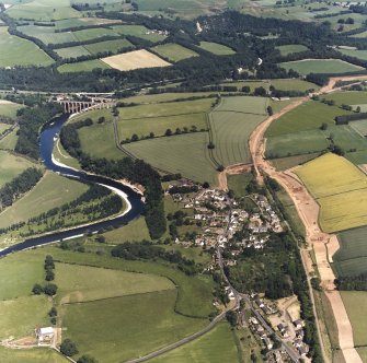 Newstead, oblique aerial view, taken from the W, showing the Newstead By-pass under construction, and Leaderfoot Viaduct in the top right-hand corner of the photograph.