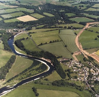 Newstead, oblique aerial view, taken from the WNW, showing the Newstead By-pass under construction, and Leaderfoot Viaduct in the top right-hand corner of the photograph.