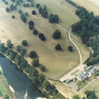 Mertoun House, oblique aerial view, taken from the ESE, centred on the country house and the formal gardens.