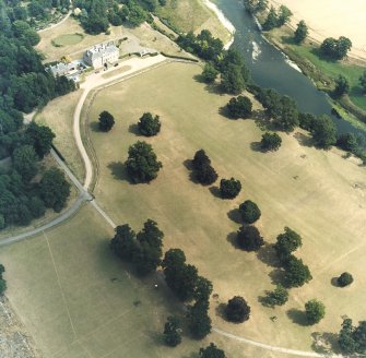 Mertoun House, oblique aerial view, taken from the WNW, centred on the country house and the formal gardens.