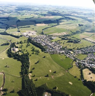 Oblique aerial view centred on the town with the castle adjacent, taken from the NNW.