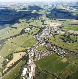 Oblique aerial view centred on the town with the castle adjacent, taken from the NW.