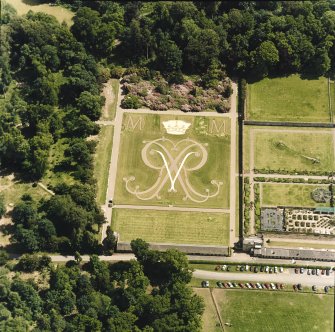 Oblique aerial view centred on the formal garden, taken from the NW.