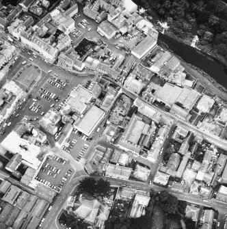 Oblique aerial view of excavations in Roxburgh Street.  Also visible is The Square, The CRoss Keys Hotel and the Town Hall.