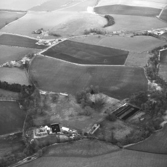 Oblique aerial view centred on site of hospital from SSW.