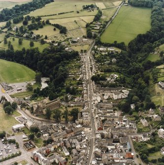 General oblique aerial view of Jedburgh, the jail, burial ground and abbey, taken from the NE.