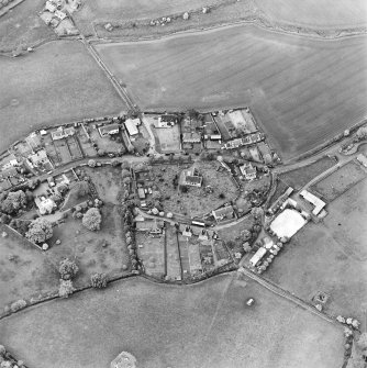 Oblique aerial view of Roxburgh centred on the church and churchyard, taken from the SSE.