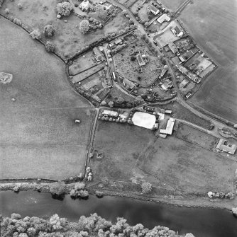 Oblique aerial view of Roxburgh centred on the church and churchyard, taken from the E.