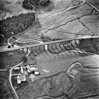Oblique aerial view from NE.
