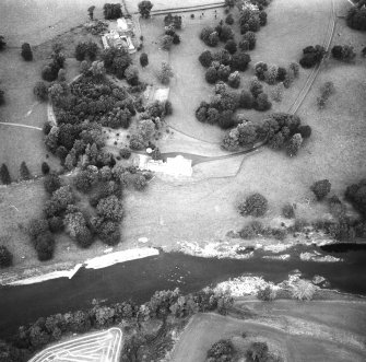Oblique aerial view centred on country house from N.