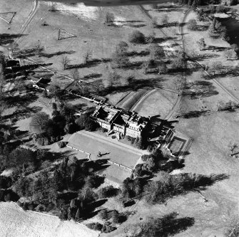 Oblique aerial view, taken from the SE.