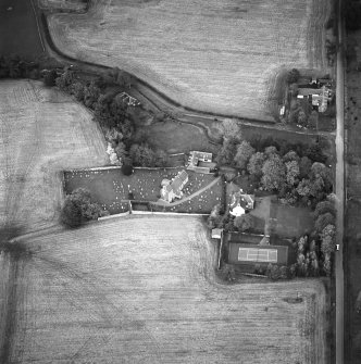Oblique aerial view of the church and manse, taken from the W.