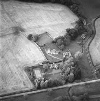 Oblique aerial view of the church and manse, taken from the S.