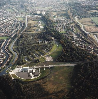 General oblique aerial view looking across the Falkirk Wheel and canals towards Falkirk and Grangemouth, taken from the W.