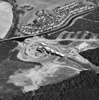 Oblique aerial view centred on the construction of the Falkirk Wheel, taken from the SW.