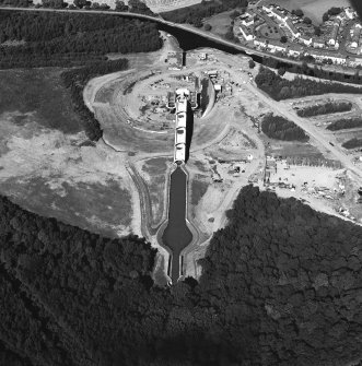 Oblique aerial view centred on the construction of the Falkirk Wheel, taken from the S.