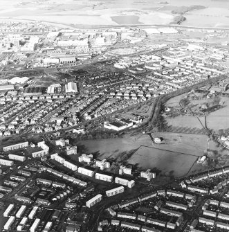 General oblique aerial view of the town and canal, taken from the SE.