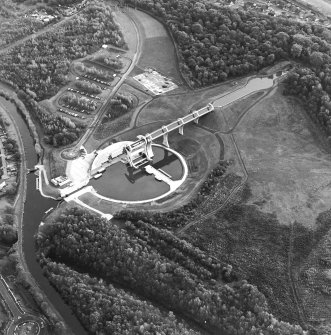 Oblique aerial view centred on the Falkirk Wheel with the remains of the works adjacent, taken from the NW.