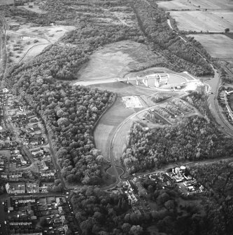 Oblique aerial view centred on the Falkirk Wheel with the remains of the works adjacent, taken from the E.