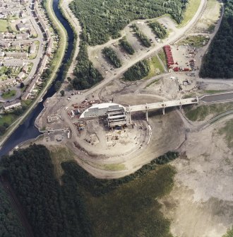 Oblique aerial view centred on the construction of the Falkirk Wheel, taken from the W.