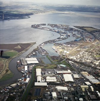 General oblique aerial view centred on the docks, taken from the SW.
