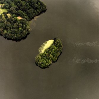 Oblique aerial view centred on the site of the castle, taken from the W.