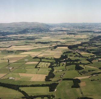 General oblique aerial view looking across the Forth Valley from Boquhan towards Dunblane, taken from the SW.