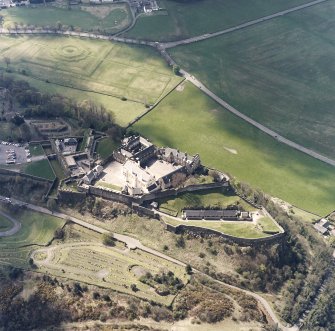 Oblique aerial view centred on the castle with the garden adjacent, taken from the NNE.