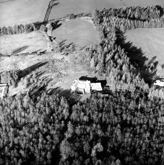 Oblique aerial view centred on the country house, taken from the S.