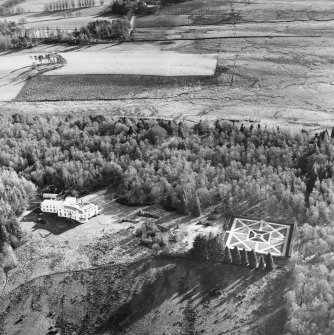 Oblique aerial view centred on the country house and walled garden, taken from the NNW.